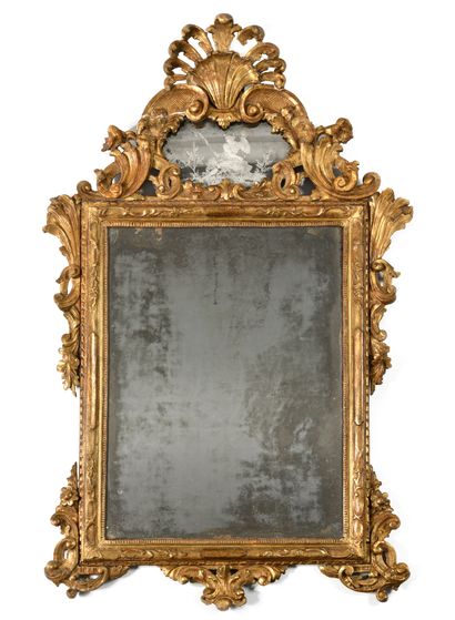 Gilded wood mirror with openwork decoration...