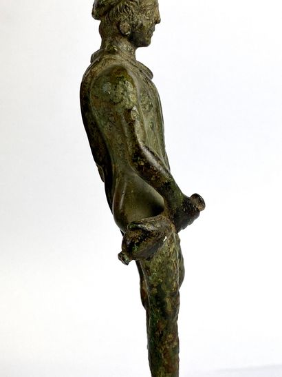 null Half-naked Mercury holding the caduceus. He is wearing a petascope. Bronze with...