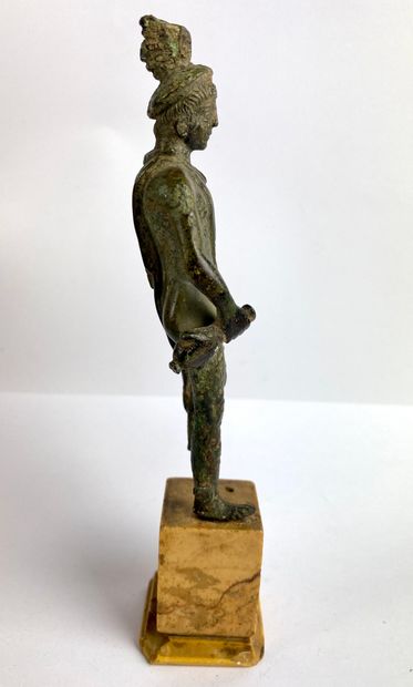 null Half-naked Mercury holding the caduceus. He is wearing a petascope. Bronze with...