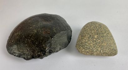 Lot including a polished axe and a pebble...