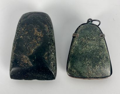 null Lot including a miniature Serpentine axe. Modern mounting in Neolithic pendeloque...