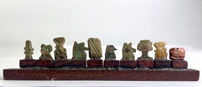 Amulets and fragments of amulets including...