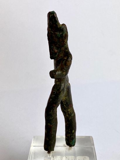 null Statuette of Amun walking Bronze, accidents and missing parts Egypt or Nubia,...