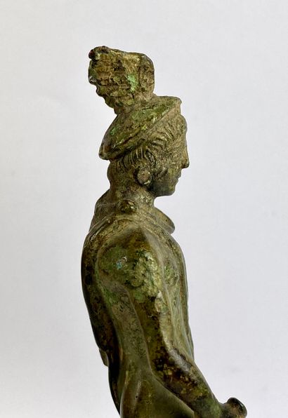 null Half-naked Mercury holding the caduceus. He is wearing a petascope. Bronze with...