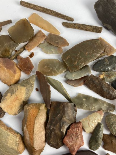 null Lot of miniature polished axes, arrowheads, bone needles Grey stone Sub-Saharan...