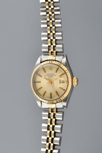  ROLEX Date. Ref: 6917. N°5793235. Circa 1979. Gold and steel ladies' watch, signed...