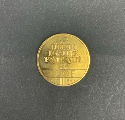 null MONNAIE DE PARIS Commemorative coin of 100 Francs gold 1986, Statue of Liberty....