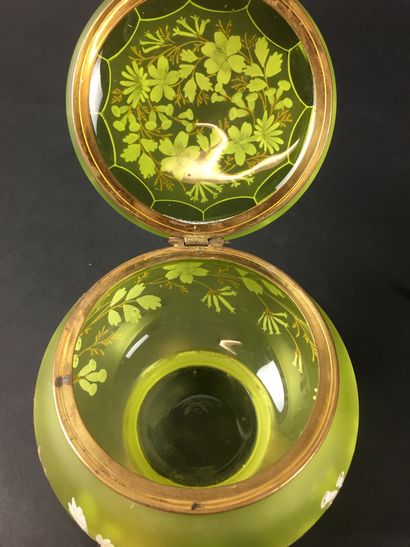 null FOUR BONBONNIERES in engraved and tinted glass, and enamelled earthenware.