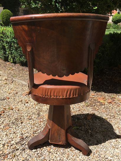 null HARPIST CHAIR in mahogany veneer with gondola back. Tripod base. 19th century....