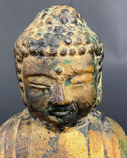 null CHINA Cast iron Buddha with traces of gilding. H: 15 cm (wear)