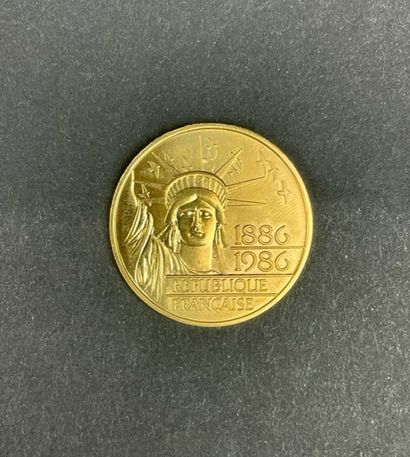  MONNAIE DE PARIS Commemorative coin of 100 Francs gold 1986, Statue of Liberty....