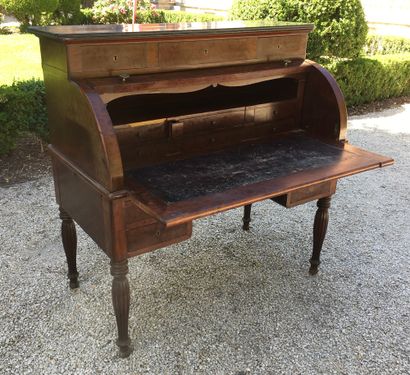 null CYLINDER DESK with side pulls in mahogany veneer opening on four drawers in...