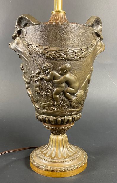 AFTER CLODION Bronze baluster vase with repoussé...