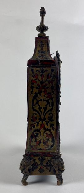 null A cartel shaped clock holder in Boulle marquetry of tortoiseshell and brass....