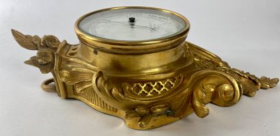 null BAROMETER in gilt bronze and chased with rocaille decoration. Signed Chevalier...