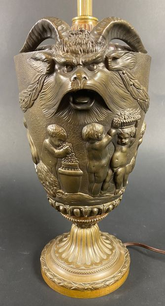  AFTER CLODION Bronze baluster vase with repoussé decoration of putti and small satyrs...