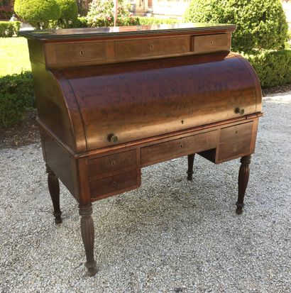 null CYLINDER DESK with side pulls in mahogany veneer opening on four drawers in...