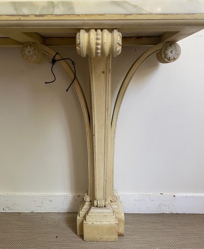 null LARGE CONSOLE in cream colored wood with double base carved in volutes. White...