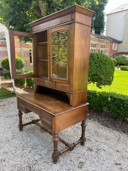 null BUREAU-BLIOTHEQUE in walnut opening with five drawers in the waist carved decoration...