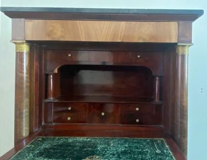 null SECRETARY in mahogany veneer, the posts with detached columns with gilt bronze...