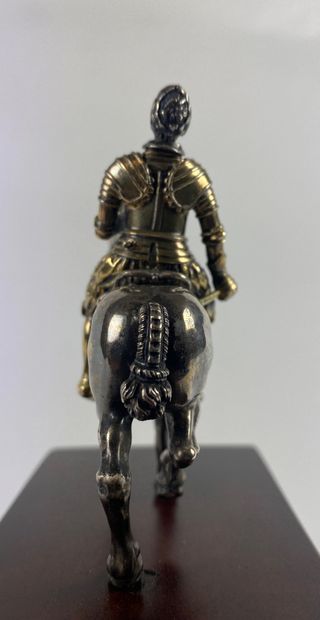 null Silver equestrian STATUE representing Henri IV on his mount. No hallmark. Mahogany...