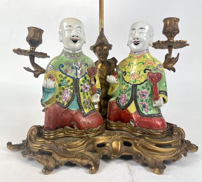 null CANDELABRE with Chinese in gilt bronze and chased foliage with two arms of light...