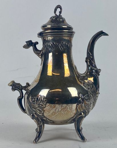 null Silver VERSEUSE with foliage decoration on a quadripod base (handle missing)....