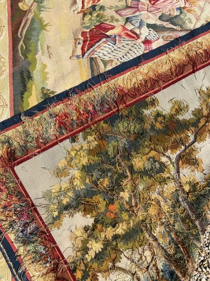 null AUBUSSON Tapestry in polychrome wool decorated with a dance scene in an undergrowth....