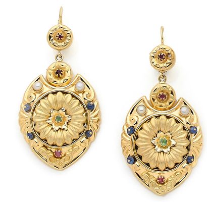 null PAIR OF EARRINGS composed of a geometrical shape decorated with a plant design...