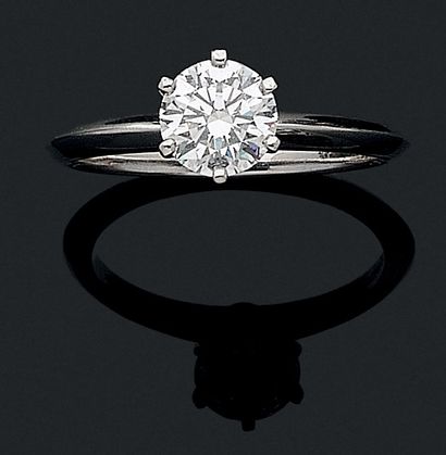 TIFFANY & CO SOLITARY RING holding a 1.10...