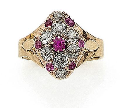 null RING set with a diamond shape holding old cut diamonds (accidents) and rubies....
