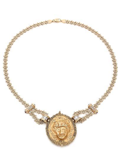 null Gold NECKLACE composed of an oval gold medallion in repoussé (44.94 x 36.60...