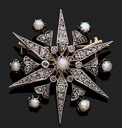 A star-shaped brooch with rose-cut diamonds...