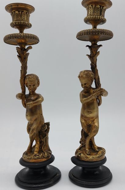 null PAIR OF CANDLES in gilded bronze decorated with fauns carrying the support

H...