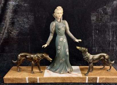 null Chryselephantine, head and hands in resin, lady accompanied by her two greyhounds,...