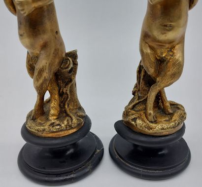 null PAIR OF CANDLES in gilded bronze decorated with fauns carrying the support

H...