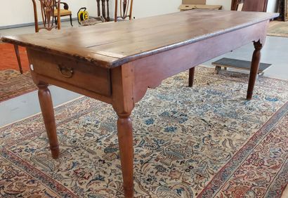 null DINING ROOM TABLE XIXth century in natural wood, drawer in belt.

H : 75 cm

W...