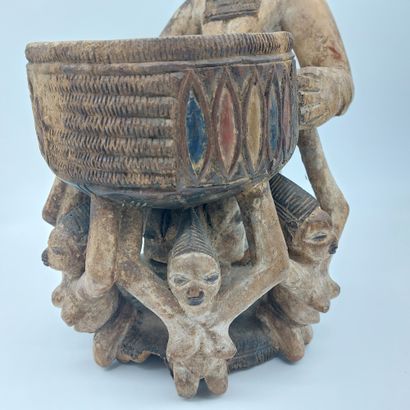 null Yoruba offering cup, Nigeria, carved and painted wood

H : 68 cm

(Misses)