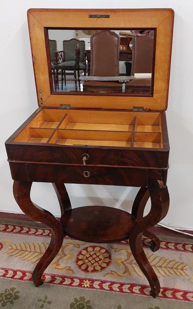 null WORKING TABLE, with mahogany veneer writing desk, flap opening on compartments...
