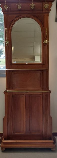 null ENTRANCE CLOTHES in walnut, brass hooks, with bevelled mirror

H : 200 cm ;...