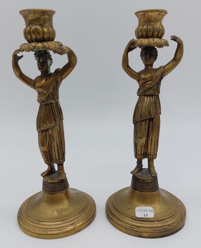 null PAIR OF CANDLES in patinated bronze decorated with antique goddesses supporting...