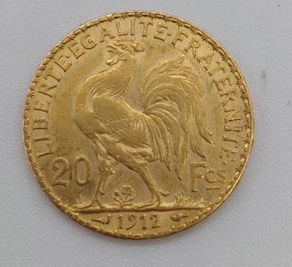 null Pièce de 20 frc en or de 1912, avers à décor du coq et revers à décor de Marianne

PB...