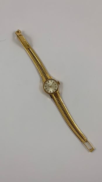 null ZODIAC About 1970. Yellow gold 750/1000 wristwatch, white dial signed, baton...