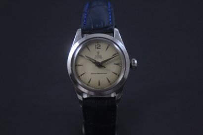 null TUDOR Oyster. Circa 1950. Ref : 7602. Wrist watch with steel case. Cream patina...
