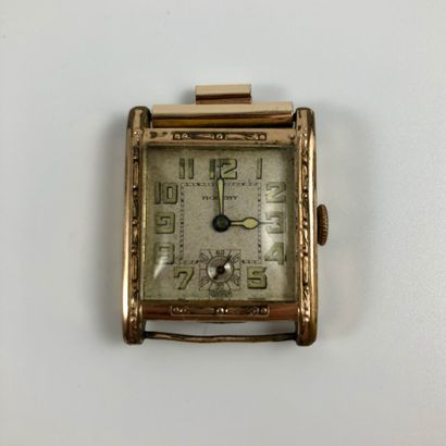 null ROBERT Rectangular watch in gold-plated metal, laminated. Arabic numeral index....