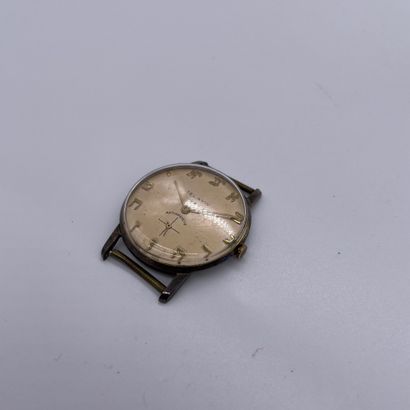 null TEL AVIV About 1970. City watch in steel. Cream colored dial signed. Applied...