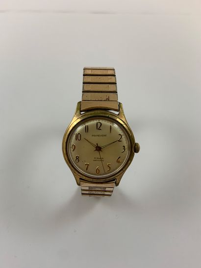 null PRIMEVERE About 1980. Gold-plated wristwatch. White dial signed. Applied Arabic...