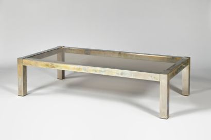 null WORK OF THE 1970S Coffee table with rectangular smoked glass top in a square...