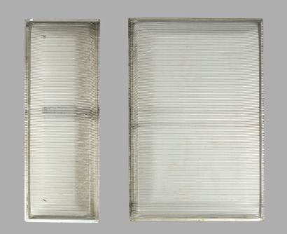 null JEAN PROUVE (1901-1984) Two panels of frontage with structure out of embossed...
