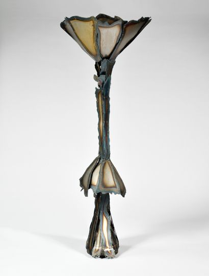 WORK OF THE 1980S Floor lamp in cut and oxidized...